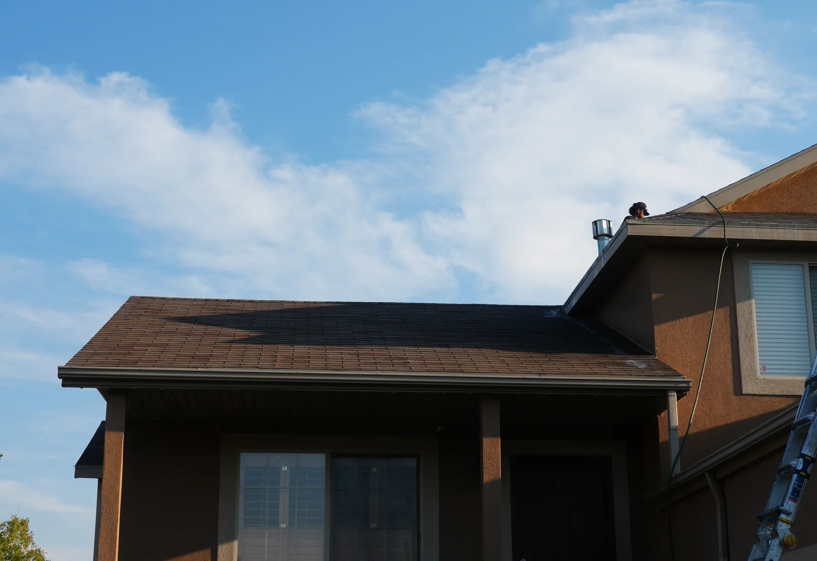 Utah home photographed during a Revive Your Roof roof rejuvenation job