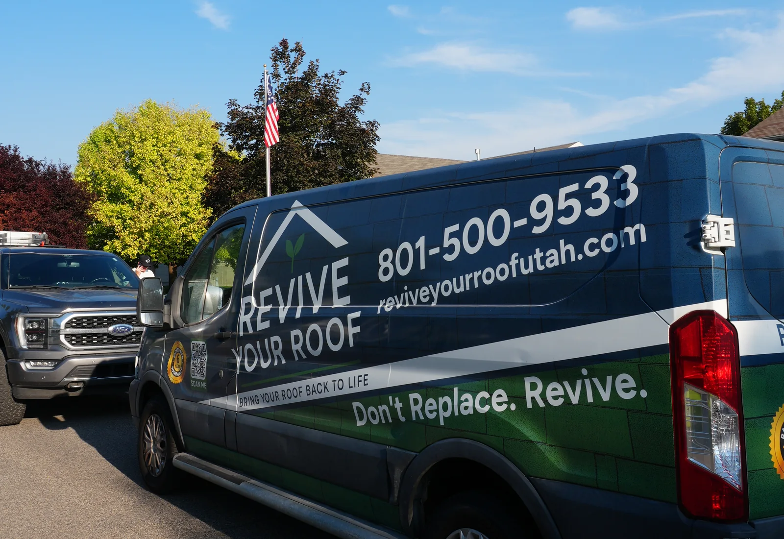 Revive Your Roof branded van parked on a residential street in Utah with the phone number on the side