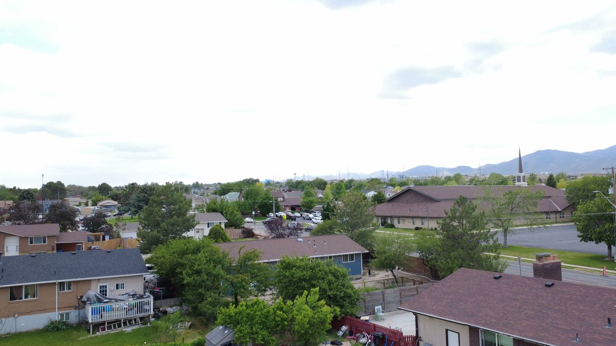 Aerial view across a Davis County neighborhood on the bench below the Wasatch canyons