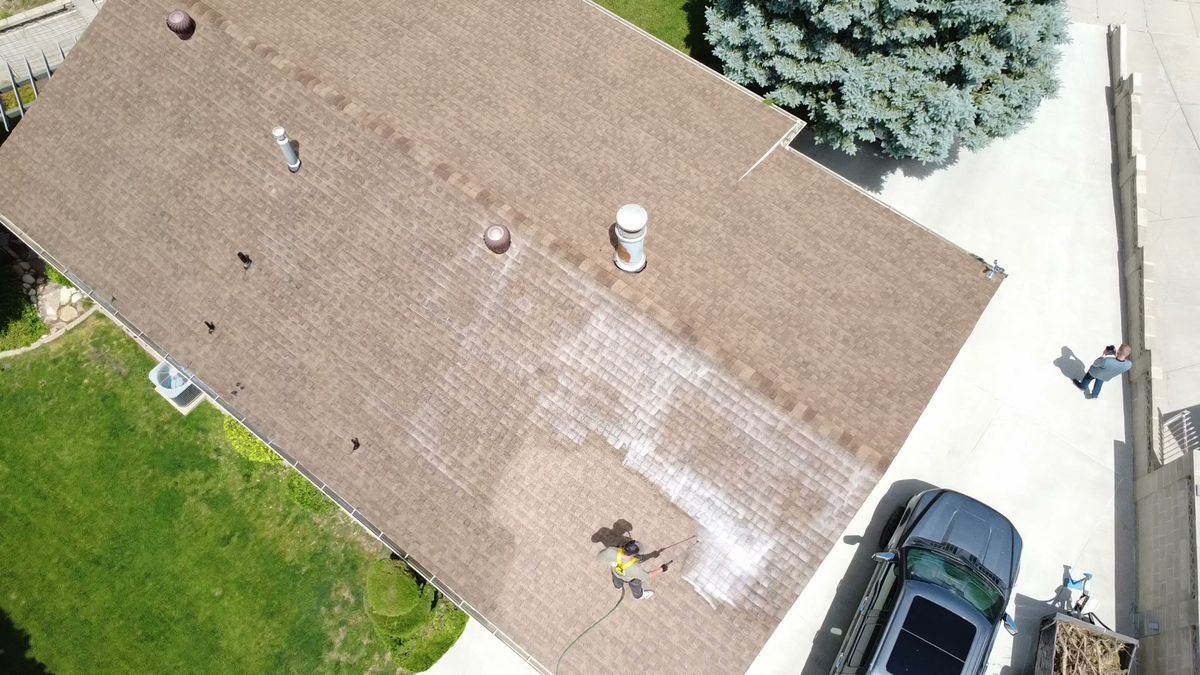 Utah roof showing treated and untreated sections side by side