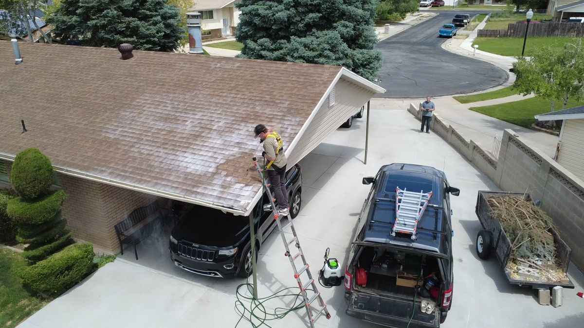 Revive Your Roof van and ladder in a Utah driveway during a job